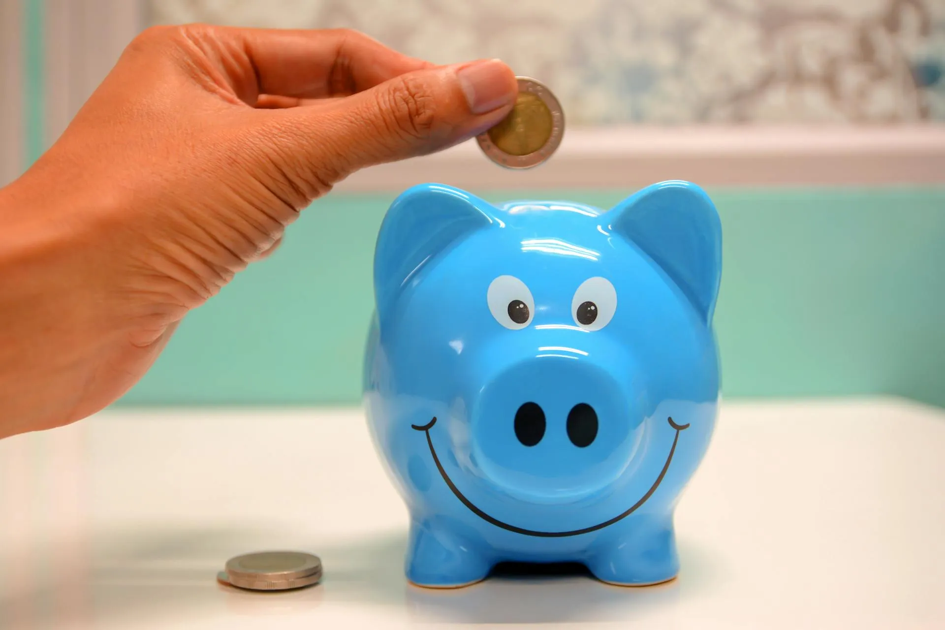 Saving money in a piggybank
