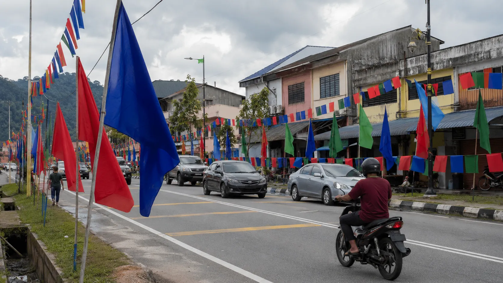 Campaign flags lining a street in a Malaysian town ahead of a state election