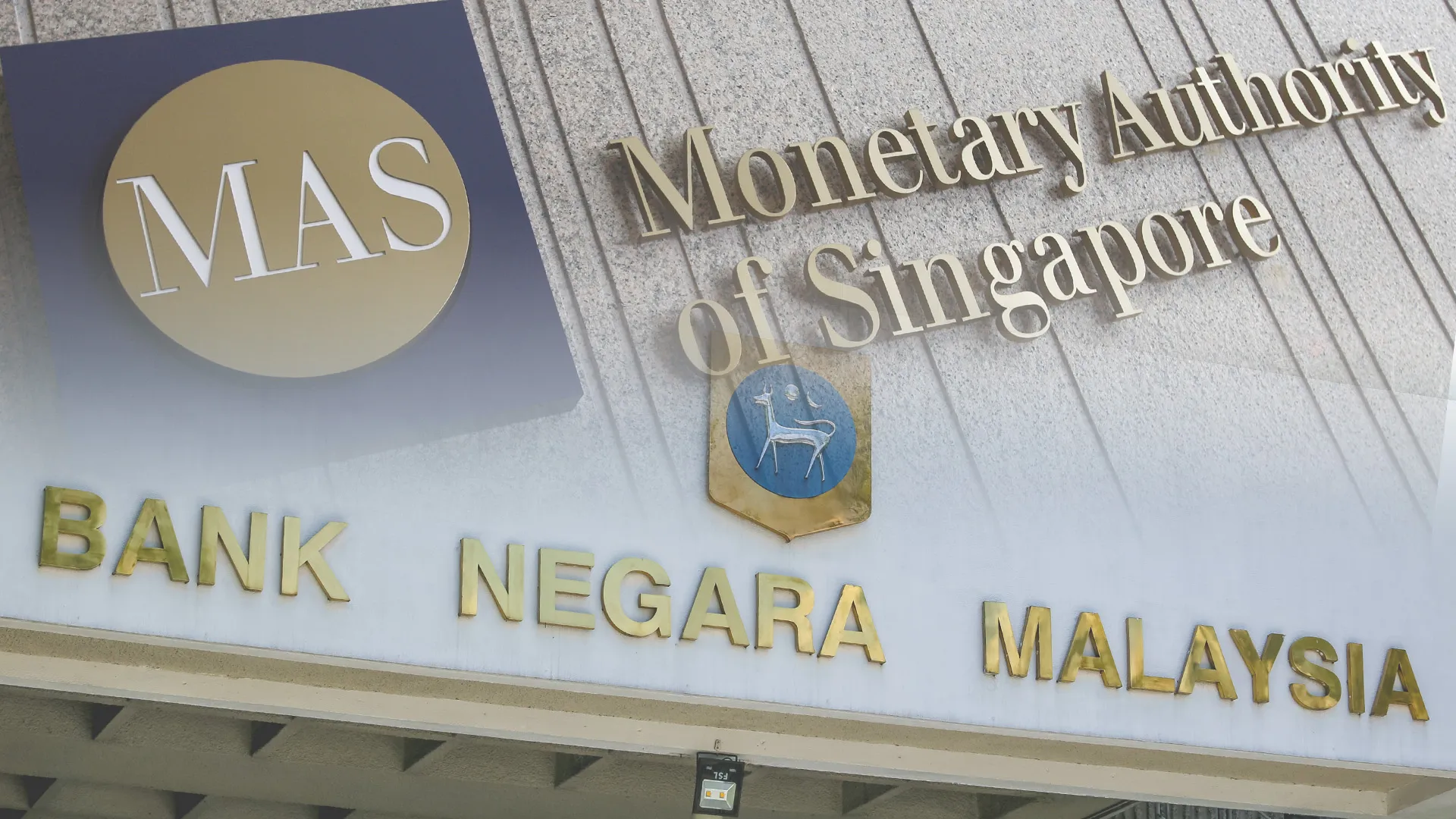 Monetary Authority of Singapore and Bank Negara Malaysia
