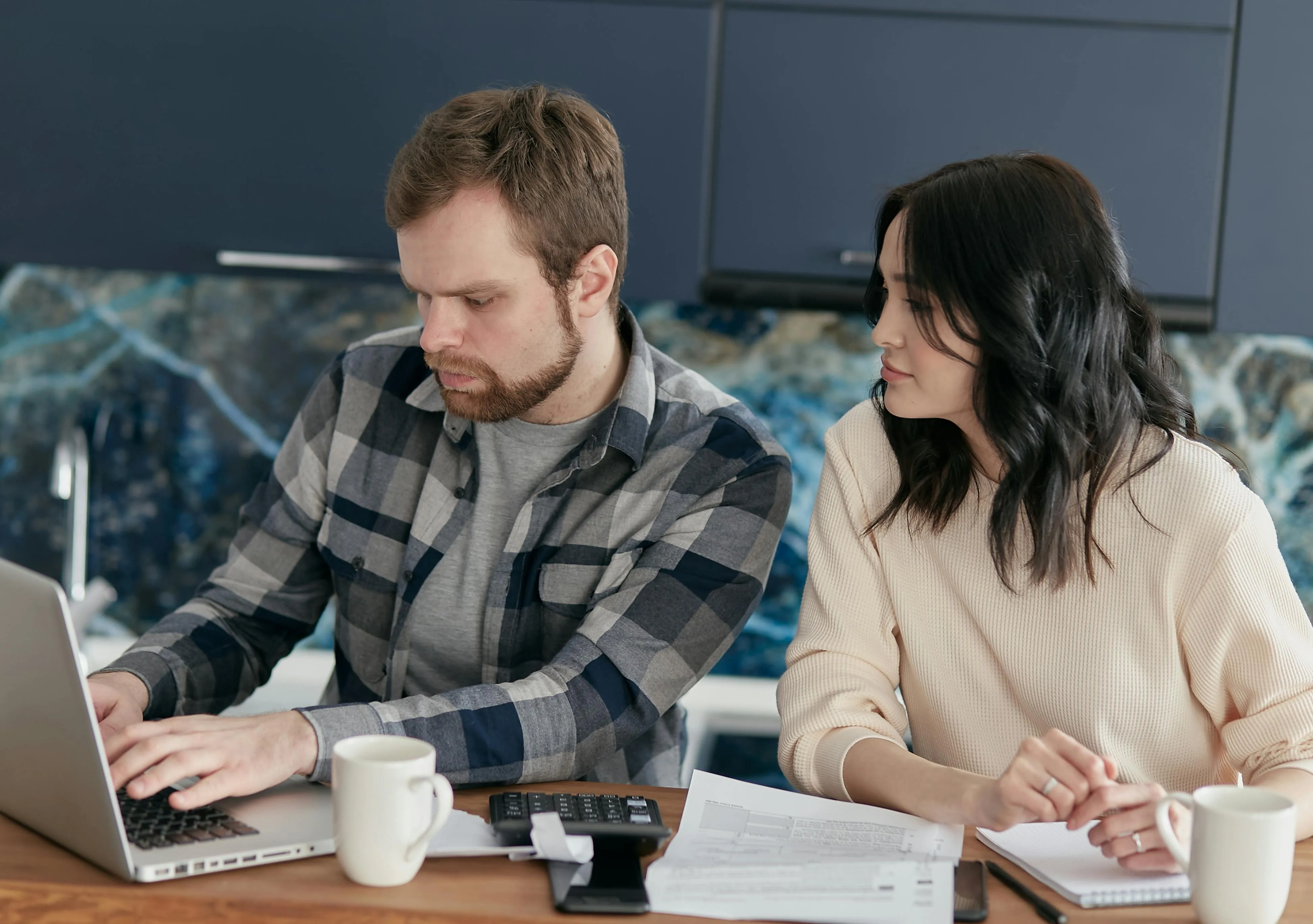 A couple reviewing their financial plan